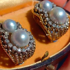 Art Deco Antique Vintage 1930s Cultured 10 mm Southern Sea Pearls 0.46 ct Diamond 18k Solid Gold  Earrings Omega Closures Van Cleef style. Earrings Size: 24 mm x 17 mm  Metal Type: 18 k Gold Weight: 22.00 grams Stones: diamonds, pearl Pearls: 7mm, 10mm Diamonds: 0.46 ct. Clarity:VSI Color:H Condition: Excellent These earrings are a stunning example of vintage elegance and sophistication. They feature a large 10mm and 7mm incredible quality and luster Tahitian pearls adorned with sparkling diamon Diamond Hallmarked Clip-on Earrings For Anniversary, Anniversary Diamond Hallmarked Clip-on Earrings, Anniversary Diamond Clip-on Earrings Hallmarked, Anniversary Diamond Clip-on Earrings, Art Deco Diamond Earrings For Anniversary, Vintage White Gold Pearl Earrings For Anniversary, Vintage Clip-on Diamond Earrings For Anniversary, Diamond Earrings With Bail For Anniversary, Art Deco Clip-on Earrings For Anniversary