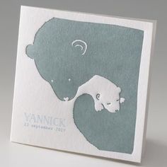 a card with an image of a polar bear on it's back and the words vannick written in blue ink