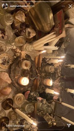 an overhead view of candles and other items on a table in a room that appears to be used as a dining area