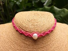 "Hand woven macrame Pearl choker necklace. This waterproof waxed string choker is the perfect beach accessory for all! Adjustable one size fits all  Hand woven Pink macrame choker with cultivated fresh water pear. Available in a variety of colors Woven with top quality waxed polyester Linhasita string from Brazil, it's waterproof and fade resistant.  Adjustable slip knot closing system, your choker will never be too tight or too loose and it will always stay in place  1/4 inch width for an elegant style. Looks great combined with other longer necklaces for a cool layered effect  You can also use it as a hair band for a summer beach look. Made with love.   :) We can also create custom work if you have any special requests. * PLEASE NOTE : The \" processing time \" is the time I need to get Adjustable Pearl Necklace For Summer Beach, Adjustable Macrame Choker, Adjustable Summer Choker, Adjustable Bohemian Pearl Necklace For Summer, Adjustable Pearl Necklace Summer Gift, Bohemian Adjustable Pearl Necklace For Summer, Handmade Pink Choker For Beach, Adjustable Pearl Necklace For Summer Gift, Waxed Cord Jewelry As Summer Gift