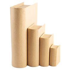 three wooden cylinders stacked on top of each other in front of a white background,