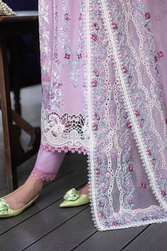 Brand: MUSHQProduct Code: MSF-06 RaffineCollection: Mushq Orient Express Unstitched Luxury Lawn CollectionFabric: Lawn PRODUCT DETAILS: Step into a world of grace and charm with Raffine in pink. Delicately embroidered and adorned with exquisite lace details, each piece is a testament to elegance. The schiffli border, paired with a scalloped dupatta, adds a touch of ethereal beauty. Package Details: Chikan embroidered & sequinned lawn front Embroidered & sequinned lawn back Embroidered & sequinned lawn sleeves Embroidered & embellished front neckline Embroidered front left &right panel (organza) Embroidered sequinned front & back sleeves border (organza) Embroidered & sequinned finishing lace (organza) Chikan embroidered & sequinned net dupatta Chikan embroidered & sequinned net border Dyed Pakistani Designer Clothes, Desi Clothes, Luxury Wear, Orient Express, Net Dupatta, Pakistani Designers, Luxury Bridal, Extra Fabric, Fabric Stores Online