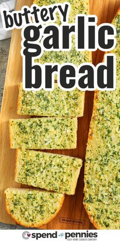 sliced garlic bread on a cutting board with the words buttery garlic bread above it