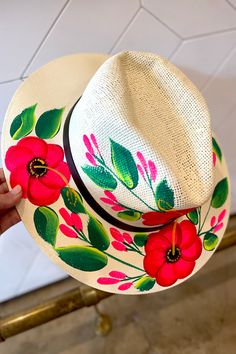 This stylish Sarasota Handpainted Hat is a must-have for any fashionista. Expertly handpainted with vibrant floral details, this straw hat adds a hint of color to any summer ensemble. Boasting a one-size-fits-all design, this hat is perfect for any summer outing. *﻿Available at our Bandit location Sarasota, Straw Hat, All Design, Hand Painted, Hats, Floral, Color, Design