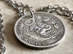 "Peru Coin Pendant Necklace Peruvian Half Sols De Oro De Oro Vintage Custom Made Rare coins - Coin Enthusiast Fashion Accessory 90% Silver The date on this coin may not be the date that you receive. You will receive a random date from my stock. If there is a special date you would like, please message me and I will see if it is in stock.   ** Any of my Necklace Pendants can be made in a Keychain. Message me at checkout to request this necklace to be a Keychain for the same price. A small piece o Handmade Antique Round Coin Necklace, Antique Handmade Coin Necklace As Gift, Handmade Antique Coin Necklace As Gift, Antique Handmade Coin Necklace For Gift, Handmade Antique Coin Necklace For Gift, Coin Pendant Necklace, Rare Coins, Coin Pendant, Silver Coins