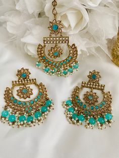 Gorgeous Earrings and Maang Tikka set- Ideal for adding refined glamour to your look! Beautiful earrings along with matching maang tikka is adorned with polki stones and studded with beads.  The picture perfect polki piece for the festivities. Very light weight, push back earrings. * Our jewelry is securely packed in a neat box to avoid any damage in transit. * Jewelry CARE: Keep the jewelry away from direct heat, water, cream, perfumes, deodorants or other strong chemicals. Always store in cool & dry place, in a plastic box, it was packed in. Jewelry should always put on last and taken off first.  Thank you Dsapphire Bohemian Earrings For Wedding And Eid, Diwali Chandbali Jewelry Sets With Latkans, Eid Jewelry Sets With Chandbali Latkans, Eid Jewelry Sets With Latkans And Chandbali Shape, Bohemian Style Chandbalis For Wedding, Turquoise Earrings For Festive Occasions, Festive Turquoise Earrings For Gift, Festive Sets With Matching Earrings For Celebrations, Festive Celebration Sets With Matching Earrings