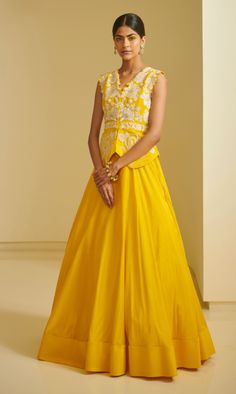 Editor's Note Lehenga set filled with Resham thread work, heavy embellishments like - pearl, sequence, stones, cutdana. Fabric: Net Color: Yellow Care: Dry Clean Only About the Designer Varun’s... Varun Bahl, Chikankari Lehenga, Yellow Lehenga, Yellow Skirt, Embroidered Neckline, Embroidered Skirt, Indian Designer Outfits, Lehenga Designs, Embroidered Jacket