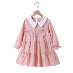 Product Title: Girls Long Sleeve Doll Collar Pleated Dress Girls DressesKeyword Tag: Cow Onesie Baby* Soft Feeling & Cozy Comfortable* Package Package Included: 1 Dress* Fabric & Fabric: 100% Viscose* Available for Machine Wash as well as TumbleDry* Imported* Imported Are you look for a best quality and cheapest dress? Then Girls Long Sleeve Doll Collar Pleated Dress Girls Wholesale Dresses is the best one for you! The New style with amazing designs for reflect fashion vibes that will embrace yo Spring School Dress With Peter Pan Collar, Pink Long Sleeve Dress For Playtime, Long Sleeve Ruffled Dress For School, Long Sleeve Cotton School Dress, White Long Sleeve School Dress, Playful Doll Collar Dresses For Spring, Playful Ruffled Dresses For School, Playful Spring Dress With Doll Collar, Cute Pink School Dress