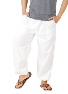 PRICES MAY VARY. SOFT, LIGHTWEIGHT, AND BREATHABLE : These mens white sweatpants are perfect for hot summer days. They're made of 100% cotton and are breathable, ultra-light and sheer, keeping you cool and comfortable all day long. ELASTIC WAISTBAND : The drawstring and elastic waistband on these baggy white pants allows you to adjust the fit to make them more comfortable and accommodating to any weight fluctuations. Whether you're lounging around the house or going out for a run. These yoga pan White Baggy Casual Harem Pants, Comfortable White Baggy Bottoms, Baggy White Pants For Leisure, Baggy White Leisure Pants, Comfortable Baggy White Pants, White Baggy Leisure Pants, White Harem Pants With Pockets For Loungewear, White Harem Pants With Pockets And Loose Fit, Baggy White Harem Pants With Elastic Waistband