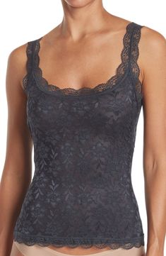 Allover lace packs on the va-va-voom style when you wear this alluring cami. . Scoop neck. Sleeveless. Allover lace construction. Approx. 23.5" length (size S). Imported  This item cannot be shipped to Canada. Machine wash 90% nylon, 10% spandex Lace Camisole With Lace Closure, Summer Lace Closure Sleeveless Camisole, Sleeveless Lace Closure Camisole For Summer, Sleeveless Lace Top With Lace Closure, Sleeveless Summer Camisole With Lace Closure, Summer Sleeveless Camisole With Lace Closure, Summer Lace Closure Camisole, Black Sleeveless Delicate Lace Top, Summer Camisole With Lace Closure