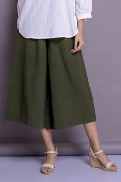 Wide Leg Pants, Linen Palazzo Pants, Loose Pants, Casual Baggy Pants - Custom made by Modernmoveboutique >DESCRIPTION: - loose and roomy. - Side patch pockets - made from Linen blend. The fabric is of medium weight (185 g). - the model is 172 cm high (regular XS - S) and is wearing size S. - color in the picture - OLIVE GREEN (Please choose any other color on the right). >COLOR< NOTE - The pants are available in 25 colors. - We found out the fabric to be rather hard to photograph to hav Khaki Wide Leg Ankle-length Pants With Relaxed Fit, Khaki Wide Leg Ankle-length Pants With Loose Fit, Ankle-length Wide Leg Khaki Pants, Summer Workwear Khaki Harem Pants, Khaki Harem Pants For Workwear In Summer, Khaki Wide Leg Bottoms With Relaxed Fit, Baggy Culottes With Pockets, Green Wide Leg Harem Pants With Pockets, Casual Cotton Straight Culottes