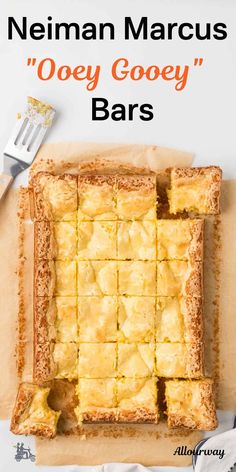 a close up of a pie on a cutting board with the words neiman marcus'ooey gooey gooey bars