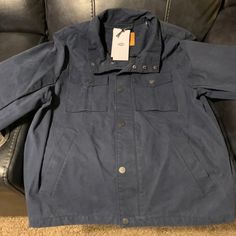 This Is A Amazing Ugg Waxed Denim Jacket! Very Stylish & Timeless Piece. Dress It Up Or Down, You Can’t Go Wrong With This Jacket. Brand New Never Worn. Obo Navy Cotton Windbreaker With Pockets, Casual Navy Sport Coat With Patch Pockets, Navy Casual Button-up Utility Jacket, Navy Casual Cotton Utility Jacket, Casual Navy Cotton Utility Jacket, Navy Cotton Utility Jacket For Fall, Navy Utility Jacket With Pockets For Fall, Casual Weatherproof Sport Coat For Fall, Navy Casual Outerwear With Pockets