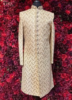 This Arjun Sherwani is designed for that special wedding, semi-formal, or formal. After all, it is truly perfection in an elegant almond white color with intricate gold embroidery and embellishments. It's sophisticated, just as the contemporary bridegroom or man of memories, and this traditional sherwani has been made special for every special occasion. Key Details: Size: Ready-to-ship size; can make any other size within 3-6 weeks. Accessories: Dupatta/Shawl, Mojari/Shoes, Safa/Pagri, and ornam Cream Sherwani, Indian Bridal Couture, Fremont California, Traditional Indian Clothing, Celebrity Closet, Indian Clothing, Pearl Cream, Gold Embroidery, Key Details