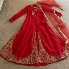 This Dress Is A 2 Piece Set And Comes With Dress And Dupatta. There Is A Center Split And The Back Is Fully Lined. Bust Is A 36 Inches Festive A-line Wedding Gown, Festive A-line Wedding Dress, Long Anarkali Gown For Formal Occasions, Formal Long Anarkali Gown, Festive A-line Silk Dress, Festive A-line Gown For Formal Occasions, Festive A-line Formal Gown, Long Sleeve Festive Gown For Formal Occasions, Long Sleeve Formal Gown For Festive Occasions