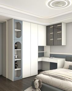 a bedroom with a bed, desk and bookcases in white and grey colors