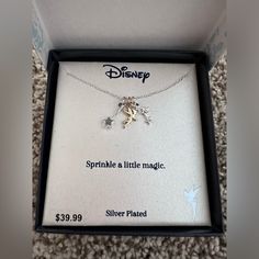 the disney necklace is in its box