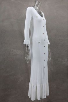 This dress features medium stretch and flare sleeves, made from a durable polyester fabric. Its solid pattern and slim fit create a pleated silhouette, while the v-neckline and button decorations add a touch of elegance. The ankle-length design and material make it suitable for all seasons, and it is designed for middle-aged women, originating from Mainland China, Guangdong. Fitted V-neck Midi Dress With Button Cuffs, Elegant Stretch Dresses With Button Closure, Backless Cocktail Dress, Cocktail Bridesmaid Dresses, Strapless Tube Dress, Backless Evening Dress, Long Sleeved Dress, 1920s Flapper Dress, Button Decorations