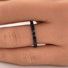 M A T E R I A L S ~ Solid Sterling Silver ~ Black Rhodium S T O N E S ~ Cruelty Free Simulated Black Diamond ~ Total Stones : 0.25ct total D I M E N S I O N S ~ Band: 2.5mm R I N G C A R E ~ Simple instructions to care for the ring is not expose your jewelry to chemicals like bleach, chlorine, hairspray, to avoid chemical reactions or breakdown of materials. (Just as you would with any jewelry) ~ Try not wear your jewelry in the shower or to bed to avoid soapy residue or accidental pulling on pr Black Stackable Diamond Ring For Gift, Fine Jewelry Black Stackable Rings, Fine Jewelry Black Stackable Jewelry, Black Stackable Rings Fine Jewelry, Black Stackable Fine Jewelry Rings, Black Stackable Fine Jewelry, Adjustable Black Rings For Anniversary, Adjustable Black Round Band Jewelry, Black Stackable Open Ring