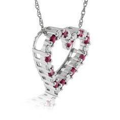 Rubies and diamonds are sequentially spaced to form a romantic heart pendant. Lose A Stone, Rubies And Diamonds, Romantic Heart, Heart Pendant Diamond, Ruby Diamond, Jewelry Cleaner, Diamond Heart, Cleaning Jewelry, A Romantic