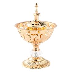 an ornately designed gold plated goblet