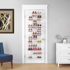 a shoe rack in the corner of a room next to a blue chair and white dresser