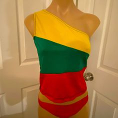 Reggae Womens Blouse One Shoulder, Sleeveless, Spandex/ Lycra New Color: Black, Yellow, Green, Red Size Fits Up To A Medium Check Measurements Below Length ~ 19 Ins Armpit To Armpit ~ 15 Ins Handmade In Jamaica By Charmaine’s Creation Fitted Sleeveless Color Block Top, Yellow Color Block Sleeveless Top, Fitted Color Block Tops For Beach, Fitted Color Block Beach Tops, Yellow Color Block Tops For Beach, Yellow Color Block Tops For The Beach, Color Block Stretch Crop Top For Summer, Summer Stretch Color Block Crop Top, Stretch Color Block Crop Top For Summer