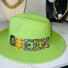 This Item Is Brand New And Made As A Custom Piece From My Accessories Boutique. You Won’t Find Another Like It. Colors Of Hat Are Two Tones, Green Top, Pink Bottom(Bright). Colors In Queen Are Gold, Black, White, Gray And White. This Item(S) Comes From A Smoke Free Home. This Is Fashion! We Believe That Any Imperfection Including Wear, Stains, Fading And Repairs Add To The Uniqueness Of Each Piece Sold Here. Thank You Shopping. Trendy Green Fitted Hat, Chic Adjustable Green Hat, Chic Green Adjustable Hat, Custom Fedora Hat, Custom Fedora, Women Hats Fashion, Hats Fashion, Women Hats, Pink Bottom