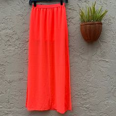 Bnwt Divided By H&M Fluorescent Orange Skirt With 2 Side Slits, Mini Skirt Under. Bottom Is Sheer Length: Waist: Spring Vacation Bottoms With Split Hem, Summer Vacation Bottoms With Split Hem, Spring Skirt With Side Slits And Split Hem, Summer Orange Maxi Skirt With Elastic Waistband, Summer Stretch Maxi Skirt With Split Design, Orange Relaxed Maxi Skirt For Beach, Summer Stretch Skirt With Split Hem, Summer Skirt With Side Slits, Summer Flowy Skirt With Side Slits