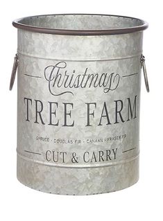 a tin can with the words christmas tree farm cut and carry on it