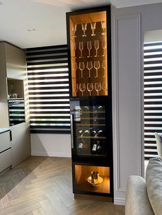 a wine cooler in the corner of a living room