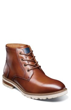 A stitched welt and sturdy lugs lend rugged appeal to a smooth leather lace-up boot with a padded collar and cushioned insole built for comfort. Lace-up style Removable, cushioned insole Leather upper/textile lining/rubber sole Imported Brown Lace-up Boots With Lug Sole And Moc Toe, Classic Brown Boots With Lug Sole, Brown Leather Chukka Boots With Lug Sole, Brown Lace-up Chukka Boots With Lug Sole, Brown Moc Toe Lace-up Boots With Stitched Sole, Brown Lace-up Boots With Moc Toe And Stitched Sole, Classic Work Boots With Lug Sole, Classic Lace-up Work Boots With Lug Sole, Casual Combat Boots With Leather Lining