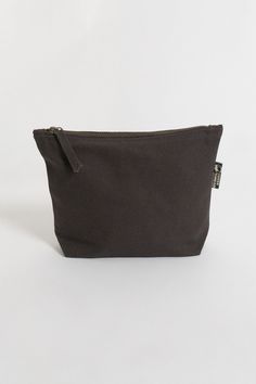 If you’ve been looking for an eco-friendly makeup bag to tame and organize cosmetic items, consider the simple and affordable Lok Pouch. Your purchase also supports Feeding America's campaign to end hunger by helping donate meals to kids and families in need. Size:  7"(H) x 9"(W) x 3"(D) Opening: 7 inches Made with 14-oz Certified Fairtrade Organic cotton canvas Long pull zipper YKK lead-free antique finish metal zippers All the accessories including zippers and fasteners are lead-free Made in a Eco-friendly Everyday Cosmetic Pouch Bag, Eco Friendly Makeup, Feeding America, Cosmetic Items, Cosmetic Containers, Organic Makeup, Chestnut Brown, Makeup Pouch, Toiletry Bags