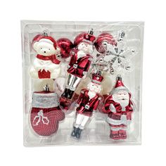 red and white christmas ornaments in a clear package with santa clause, snowman, teddy bear, ornament