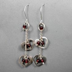 #Heart #Earrings,#Silver,Long #Dangle,2 designed Hearts,Red Garnet Beads, Romantic, Joyful, #Valentines,#accessories #JewelryByVita https://www.etsy.com/listing/182953808/ Heart Earrings Silver, Unique Gifts For Girls, Silver Heart Earrings, Bracelets Design, Women's Bracelets, Handmade Jewelry Designs, Bracelet Ideas, Earrings Long, Design Silver