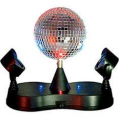 a disco ball sitting on top of a stand with three lights and two black speakers