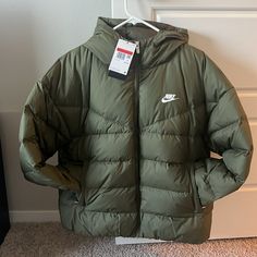 Nwt Smoke And Pet Free Home. Womens Nike Puffer Jacket Size Large. Olive Green Color Nike Hooded Puffer Jacket For Fall, Green Quilted Jacket For Winter, Khaki Hooded Puffer Jacket For Spring, Hooded Khaki Puffer Jacket For Spring, Spring Outdoor Down Outerwear, Nike Hooded Puffer Outerwear, Nike Hooded Puffer Jacket For Spring, Nike Down Puffer Jacket For Winter, Green Down Outerwear For Fall