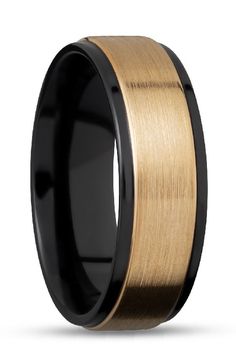 a black and gold wedding band with an inlayed design on the inside of it