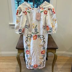 100% Cotton Made In Italy White Embroidered Floral Midi Dress, Embroidered Knee-length Midi Dress For Garden Party, White Embroidered Midi Dress With Floral Print, White Embroidered Dress With Floral Print, Midi Length, White Embroidered Knee-length Dress, Embroidered Short Sleeve Midi Dress For Garden Party, Embroidered Midi Dress With Short Sleeves For Garden Party, Embroidered Knee-length Midi Dress For Brunch, Short Sleeve Embroidered Midi Dress For Garden Party