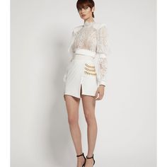 Zhivago Stretch Jersey Wrap Style Mini Skirt With Stitched Satin Waistband And Chain Feature On Hip. Nwt Size 4/Small Elegant Mini Skirt For Cocktail Occasions, Luxury White Skirt For Spring, Luxury Fitted Skirt, Elegant Mini Length Bottoms For Cocktail, Elegant Mini Bottoms For Cocktail, Luxury Fitted Cocktail Skirt, Luxury Party Pencil Skirt, Elegant Cocktail Mini Bottoms, Luxury Mini Skirt For Summer