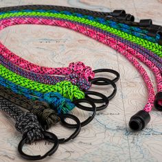 Introducing our Keyring Paracord Lanyard - Upgrade your key organization with this functional and stylish neck lanyard that provides a secure attachment point for keys, ID cards, and other small items.. Handcrafted with attention to detail using genuine, high-quality made-in-the-USA type III 550 paracord, this lanyard is perfect for professionals, students, and adventurers who value both style and security. **Key Features * Customizable length for a comfortable fit (default length: 16" strands, Key Organization, Paracord Lanyard, Neck Lanyard, Secure Attachment, Key Organizer, 550 Paracord, Badge Holders Lanyard, Eye Catching Colors, Paracord