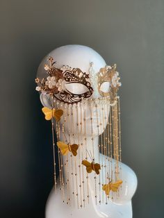 This elegant golden metal masquerade mask features dangling butterflies with floral notes and pearls. The mask is made out of comfortable and lightweight metal, great for long time wear! I N C L U D E D Mask comes with matching ribbons. S H I P P I N G -  Processed same day or within 24 hours.  1-2 day guaranteed delivery, add item to cart, click shipping tab for rates.  Pls leave a check out note with your need date & contact number  Msg for delivery time frames (Include your state/country) S I Masquerade Mask Stars, Luxury Masks And Prosthetics For Mardi Gras, Gold Masquerade Mask For Mardi Gras Festival, Gold Adjustable Masquerade Mask, Gold Fantasy Masquerade Mask For Party, Gold Fantasy Style Masquerade Mask For Party, Gold Adjustable Masks For Masquerade, Adjustable Gold Masks For Masquerade, Adjustable Gold Mask For Masquerade