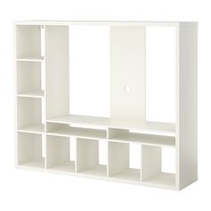 a white bookcase with several shelves on each side and an opening for the door