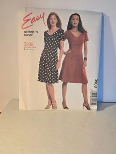 a magazine with two women in dresses on it's front cover, and the same woman standing next to each other