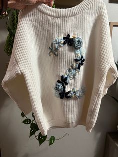 Cute Sweater For Birthday In Winter, Embroidered Winter Birthday Sweater, Notebook Embroidery, Baby Embroidered Sweater, White Long Sleeve Sweater With Floral Applique, Embroidered Sweater Kids, Baby Name Embroidery Sweater, Baby Sweater Embroidery Name, Embroidered Number