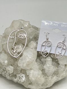 Abstract Face Pendant and Earring Set Pendant measures 2 1/8" long and 1 1/16" wide.   925 Sterling Silver Pendant Bail and Earwires  925 Sterling Silver Chain included  WWW.KARINSFORGOTTENTREASURES.COM Artsy Sterling Silver Jewelry With Artistic Design, Artsy Silver Pierced Earrings, Artsy Silver Metal Earrings, Artsy Sterling Silver Drop Earrings, Artsy Silver Earrings With Ear Wire, Artsy Nickel-free Silver Jewelry, Artistic Silver Drop Earrings, Artsy Silver Pendant Jewelry, Artsy Silver Earrings