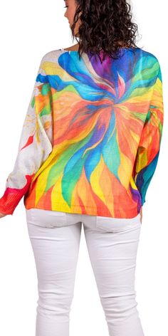 Batwing Long Sleeve Sweater Featuring a Multi-Color Floral Print. 65% Polyester, 35% Viscose One Size Fits Most Made in Italy Model 5'7" Multicolor Blouse For Vacation, Vibrant Print Tops For Vacation, Multicolor Crew Neck Blouse For Fall, Multicolor Print Long Sleeve Tops For Vacation, Fall Multicolor Crew Neck Blouse, Multicolor Crew Neck Blouse With Relaxed Fit, Colorful Long Sleeve Vacation Top, Multicolor Rainbow Print Tops For Spring, Multicolor Crew Neck Top For Vacation