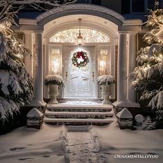 the front door is decorated for christmas with wreaths and lights