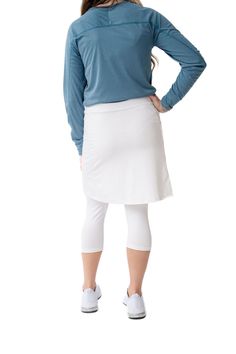 Our new Fit Snoga 18" is an above the knee skirt that is a pencil cut but still allows for movement, The ¾ attached leggings make for a modest and functional feature. A deep pocket on the skirt fits a phone or a few tennis or golf balls. This design is great for all sports and doubles as weekend hang-out gear! The fabric is chlorine safe so you are set for water activities that may await you. This is the perfect Travel Skirt! Specifications: 18 inch inseam Skirt length is 18 inches including waist band Fabric & Care: Fabric: 88% polyester, 12% spandex Moisture absorbing & fast drying Chlorine and water safe Holds stretch Machine wash cold; tumble dry low Intended Use: Features large pocket on skirt, large enough for cell phone or tennis ball Four-way stretch fabric offers maximum stretch f Courtney Toliver, Above The Knee Skirt, Travel Skirt, Knee Skirt, Ankle Length Leggings, Knee Skirts, Golf Skirts, All Sports, Swim Sets