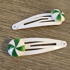 This is a set of green peppermint hair clips. The hair clips are white. They are 50mm long. You will receive two clips. White Hair Clips Aesthetic, Green Hair Clips Aesthetic, Peppermint Hair, White Hair Clips, Emerald Green Hair Clips, 3 Inch Hair Clip Sage, White Hair Clip, Christmas Hair Clips, Christmas Tree Hair